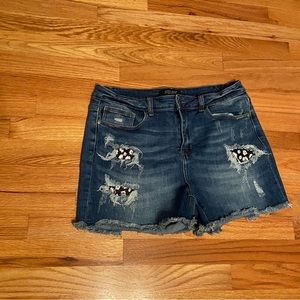 Judy Blue shorts with flower patches. New without tags
